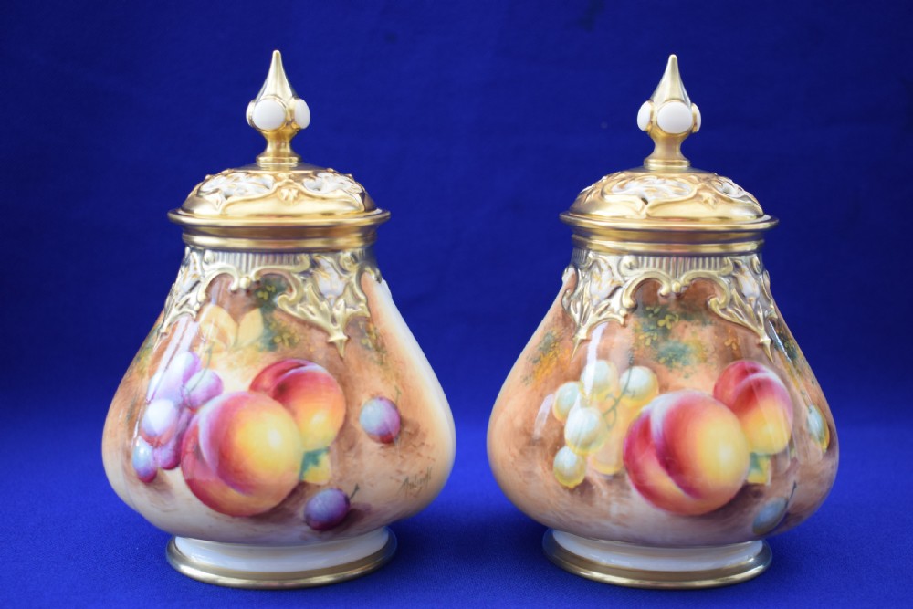 Royal Worcester pair of painted fruit pot pourri vases.
