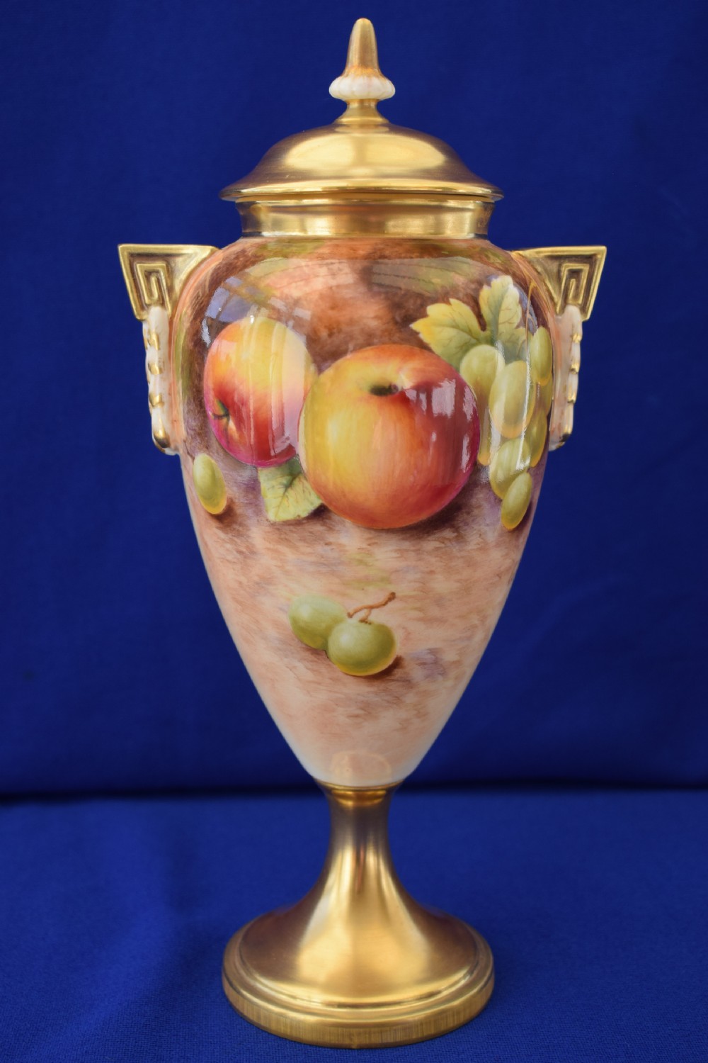 Royal Worcester painted fruit vase and cover