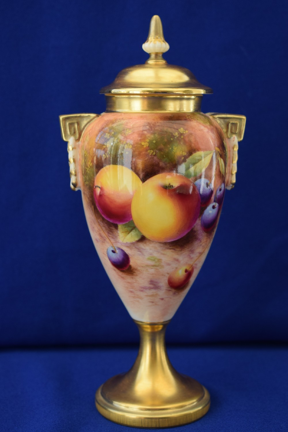 Royal Worcester painted fruit vase and cover