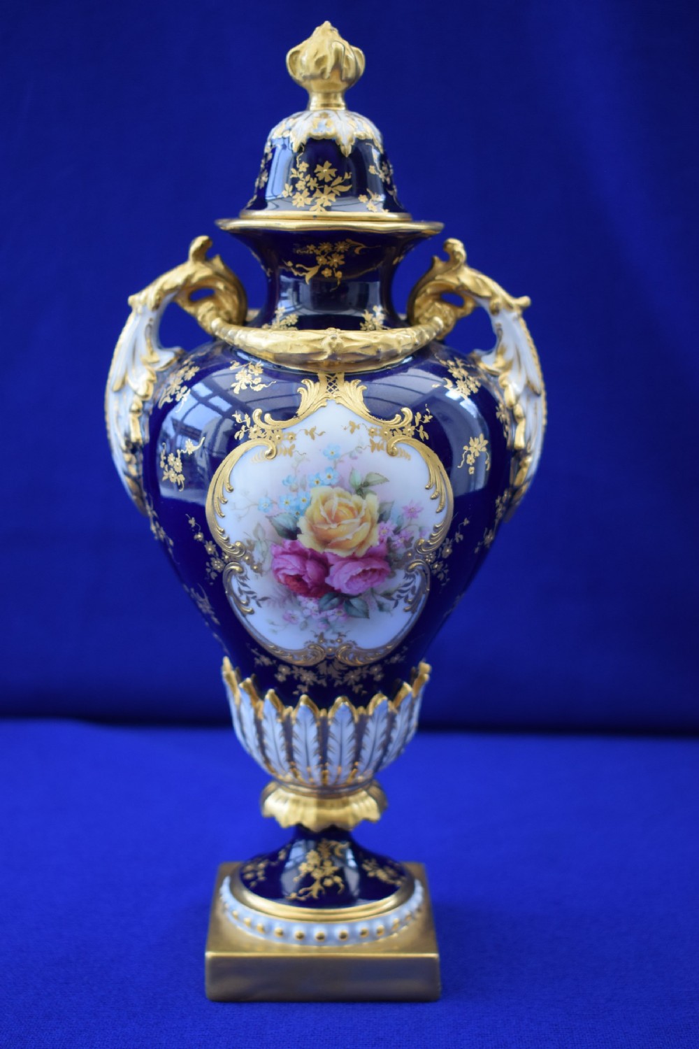 Royal Worcester vase and cover decorated roses by H Chair