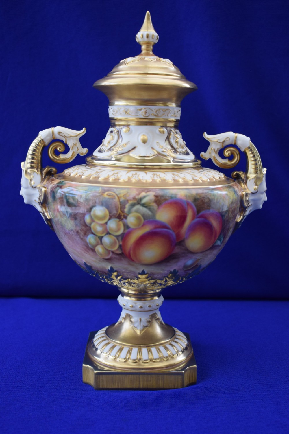 Royal Worcester painted fruit angel head vase and cover by Ayrton
