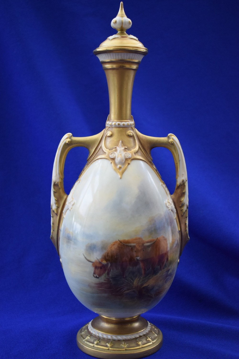 Royal Worcester vase and cover signed J Stinton