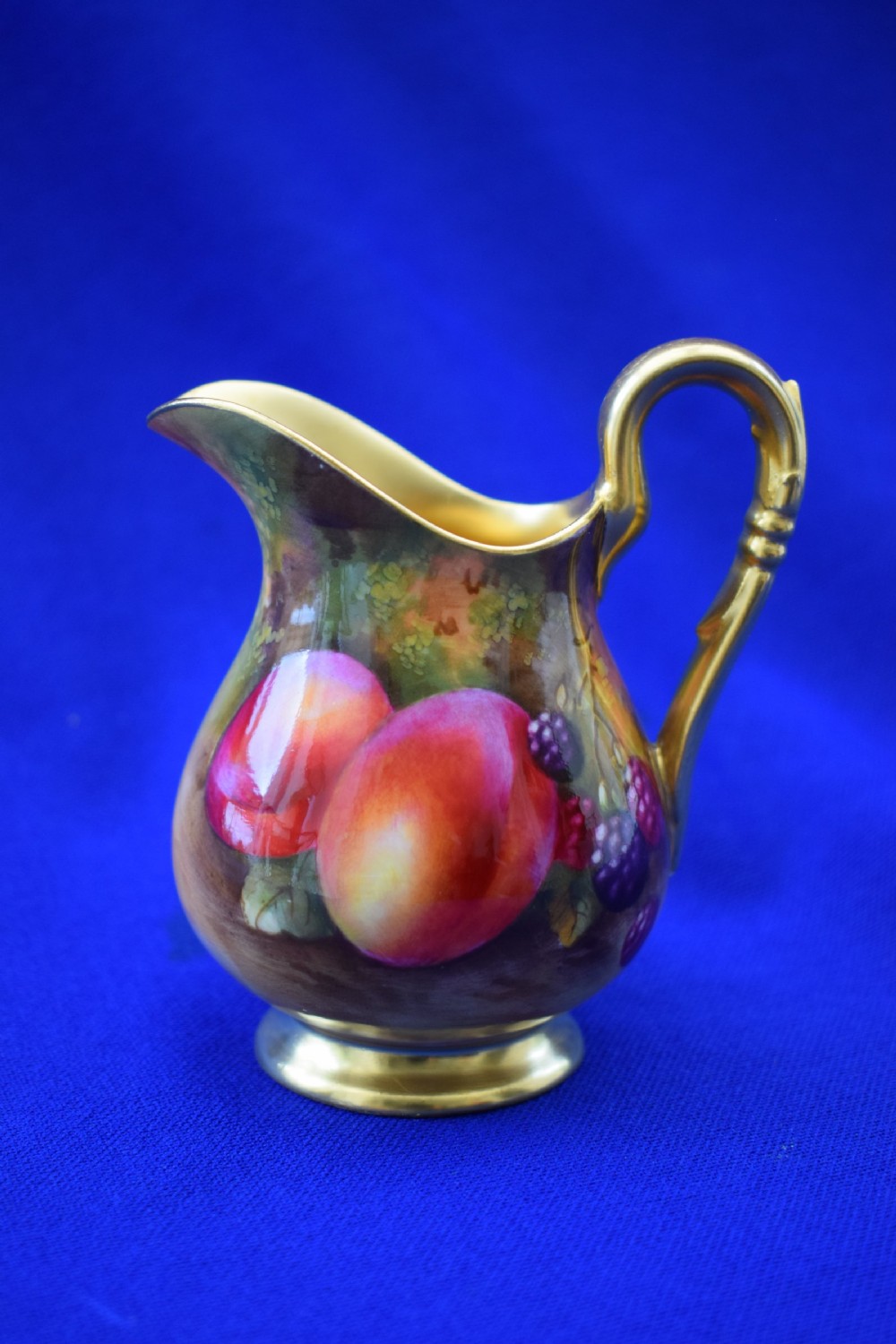 Royal Worcester painted fruit cream jug by Townsend