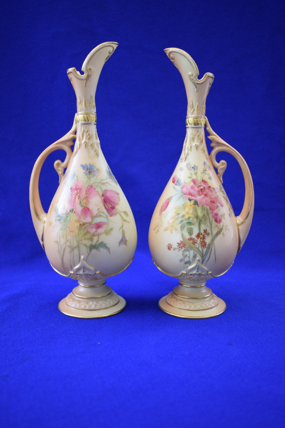 Royal Worcester pair of blush ivory ewers