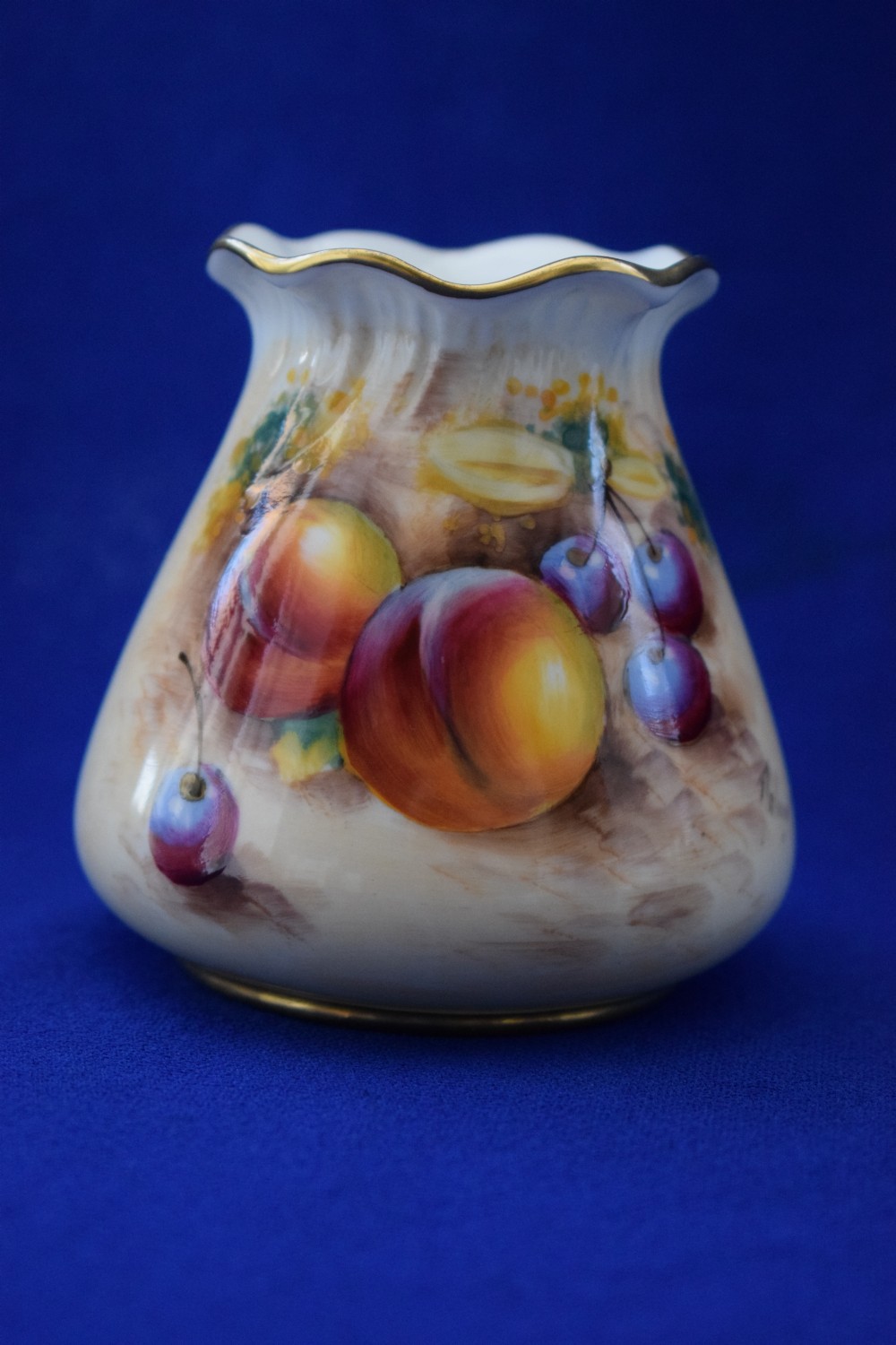 Royal Worcester painted fruit frilly neck vase