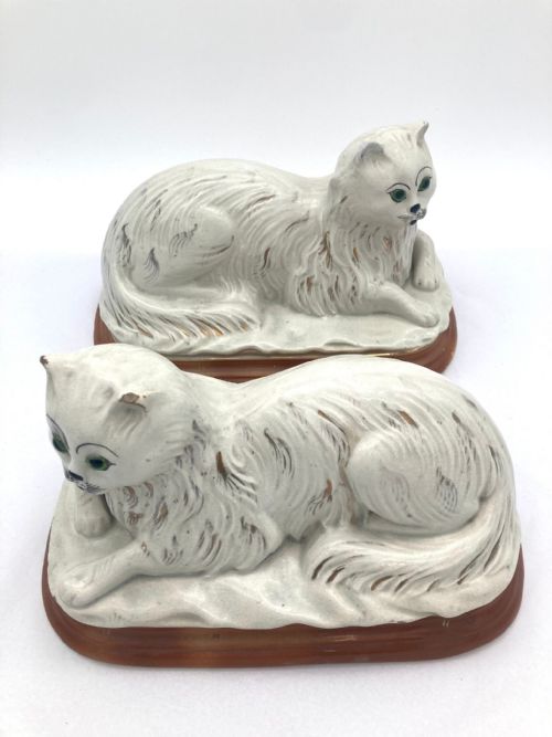 AN UNUSUAL PAIR OF LATE 19TH CENTURY RECUMBENT STAFFORDSHIRE CATS - ADDITIONAL PHOTO 11