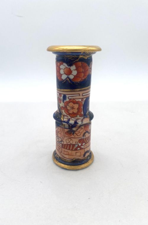 A SMALL AND UNUSUAL SCHOOL HOUSE PATTERN SPILL VASE 1820