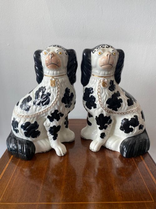 An Extremely Well Painted and Moulded Pair of Disraeli Staffordshire Dogs, 1880