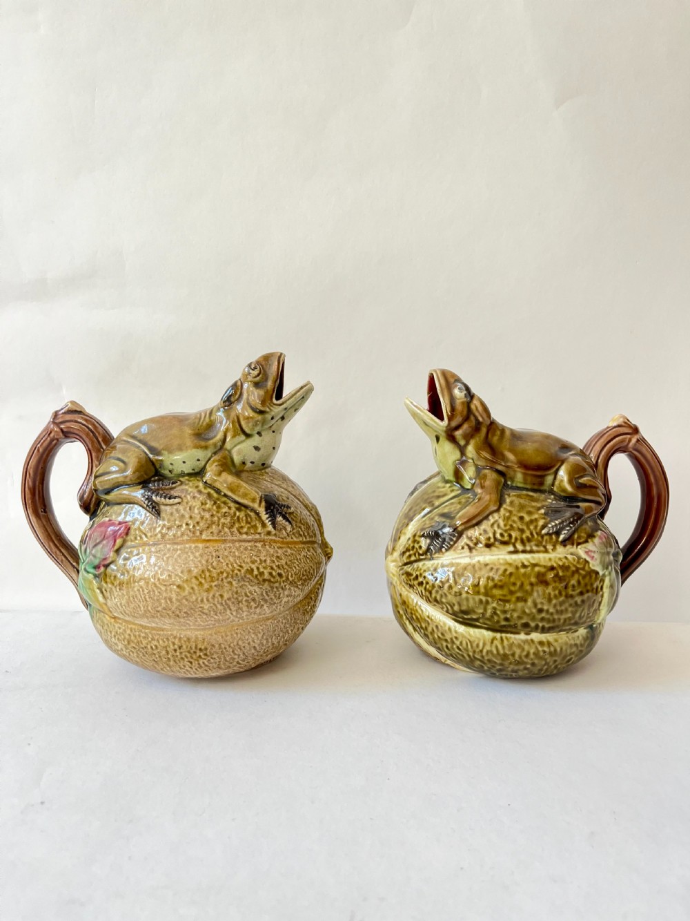 A Pr of majolica Frog Jugs 1860-80