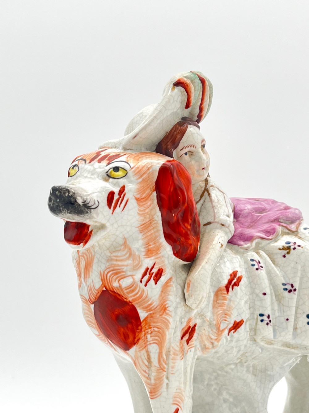 A Rare Staffordshire Pottery Royal Child on a St. Bernard. 1860-70 View II
