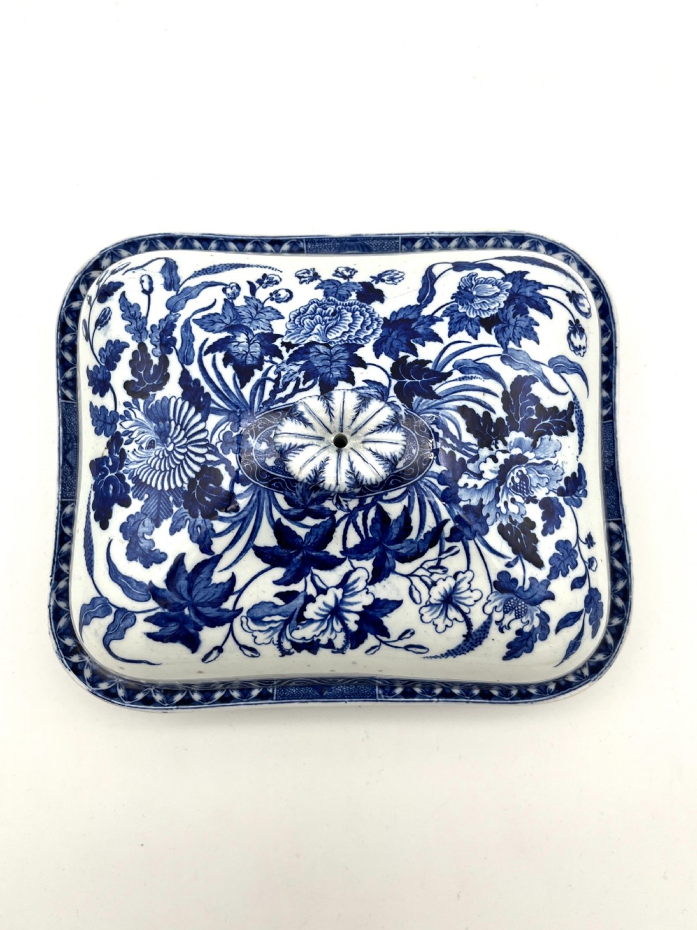 An extensive blue and white transfer-printed Wedgwood earthenware dinner service in the Hibiscus pattern featuring plates, serving dishes, and a covered tureen. View VIII