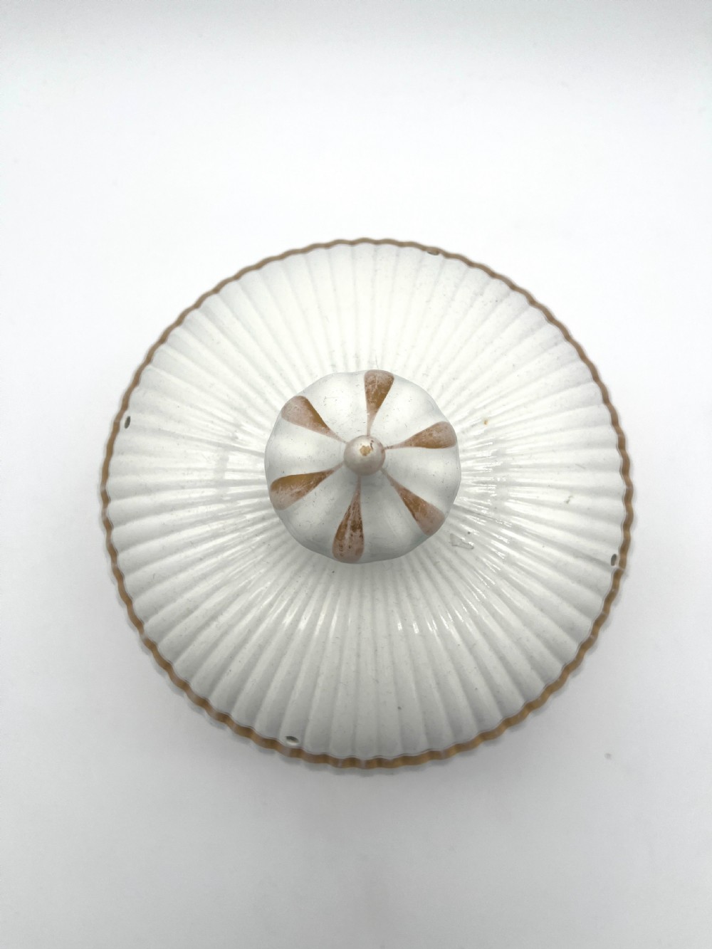 A white ribbed ironstone cheese dome and matching stand featuring gilded accent bands and a moulded finial handle. View III