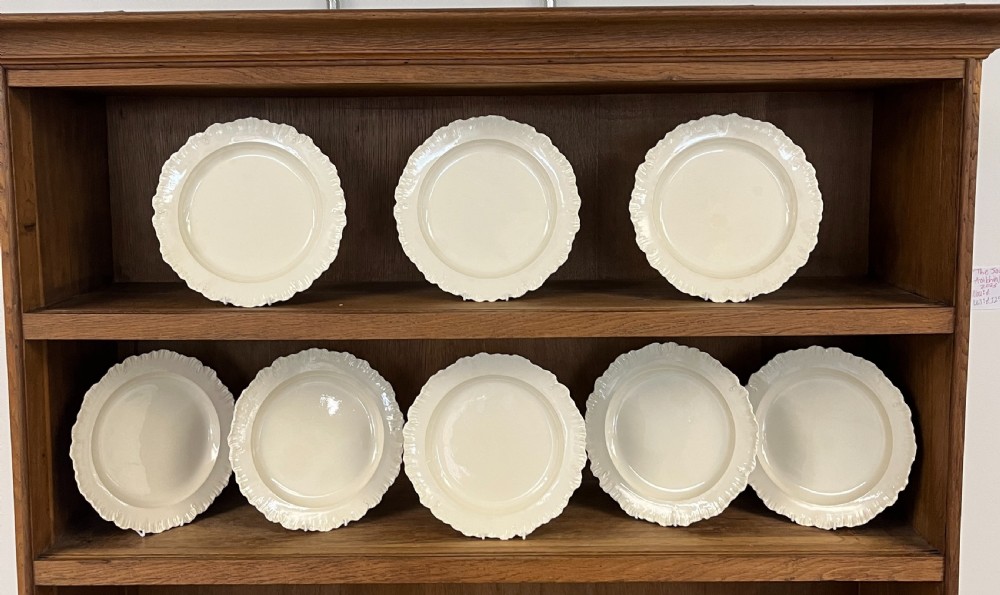 Rare Set of 8 English Creamware Feather Edged Plates. 18th Century.
