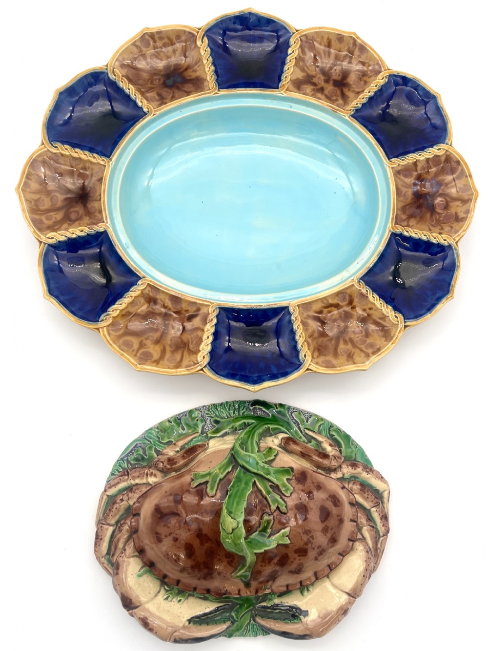 A Victorian Minton majolica ceramic tureen shaped as a crab with a green frog handle, resting on a blue and brown segmented platter. View IV
