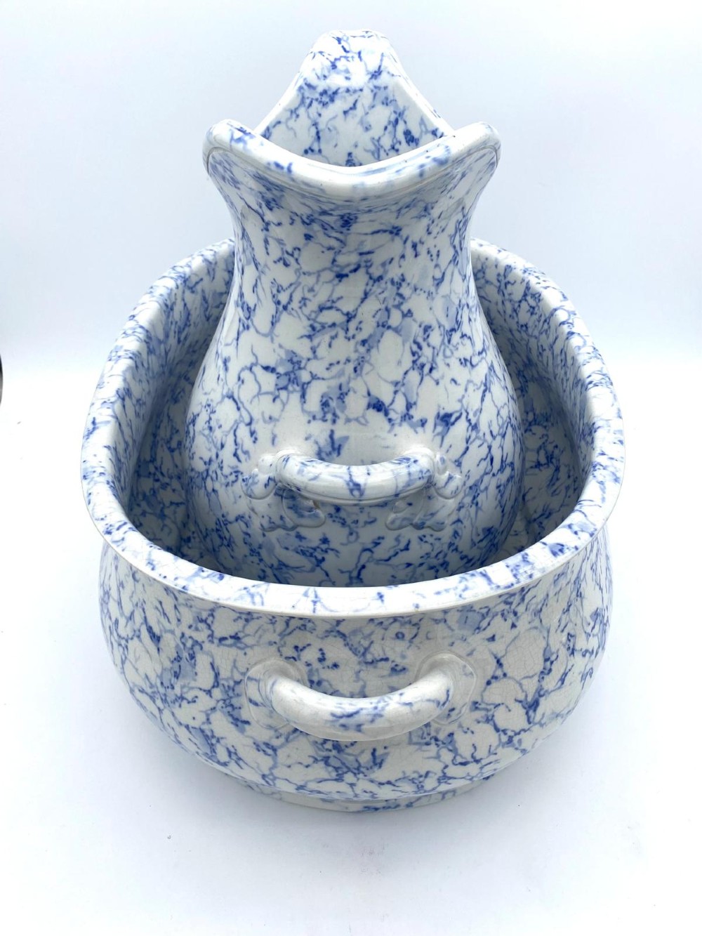 A mid-nineteenth-century Minton ceramic footbath and matching jug featuring a blue and white Italian marble transfer printed pattern. View II