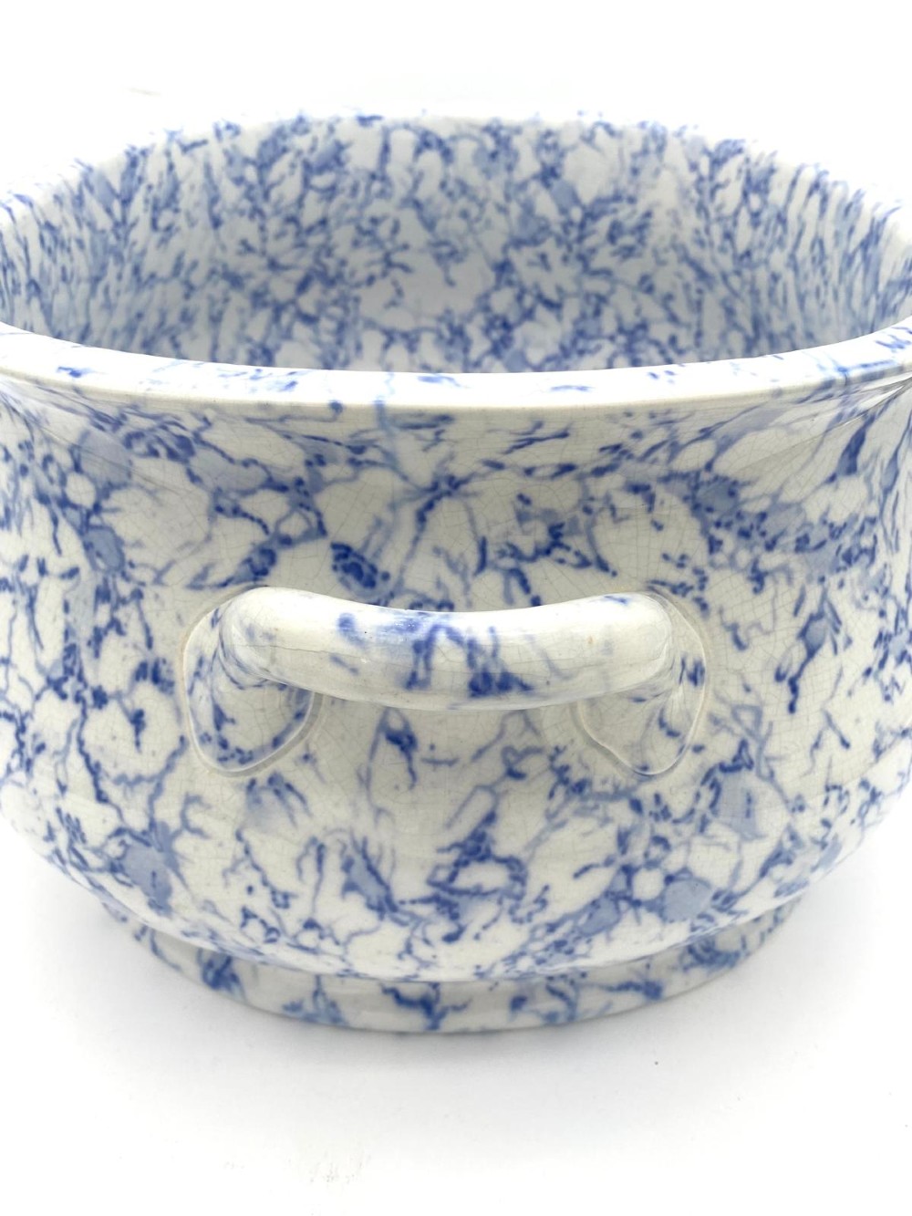 A mid-nineteenth-century Minton ceramic footbath and matching jug featuring a blue and white Italian marble transfer printed pattern. View V