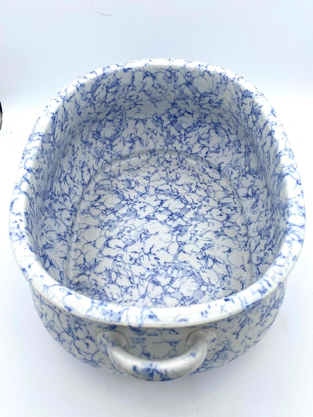 A mid-nineteenth-century Minton ceramic footbath and matching jug featuring a blue and white Italian marble transfer printed pattern. View VII