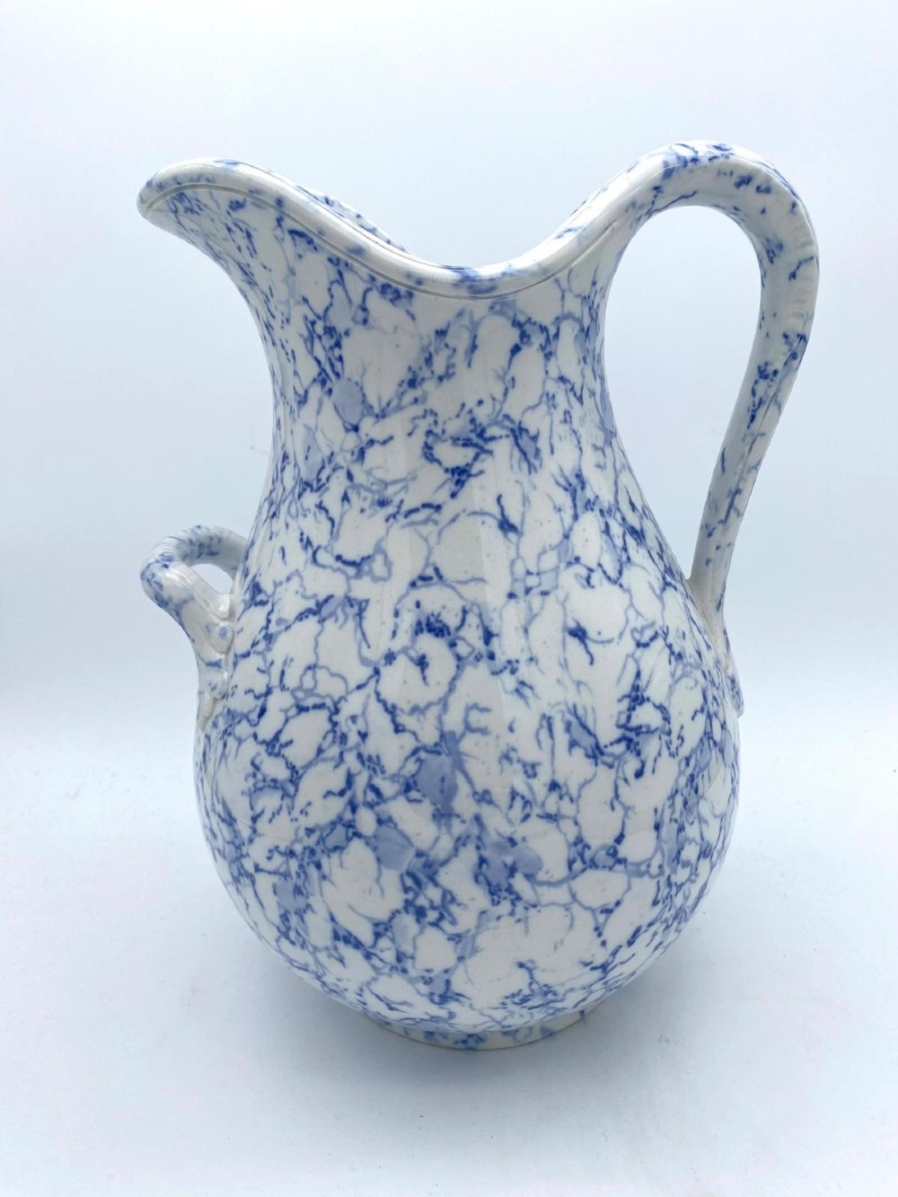 A mid-nineteenth-century Minton ceramic footbath and matching jug featuring a blue and white Italian marble transfer printed pattern. View IX