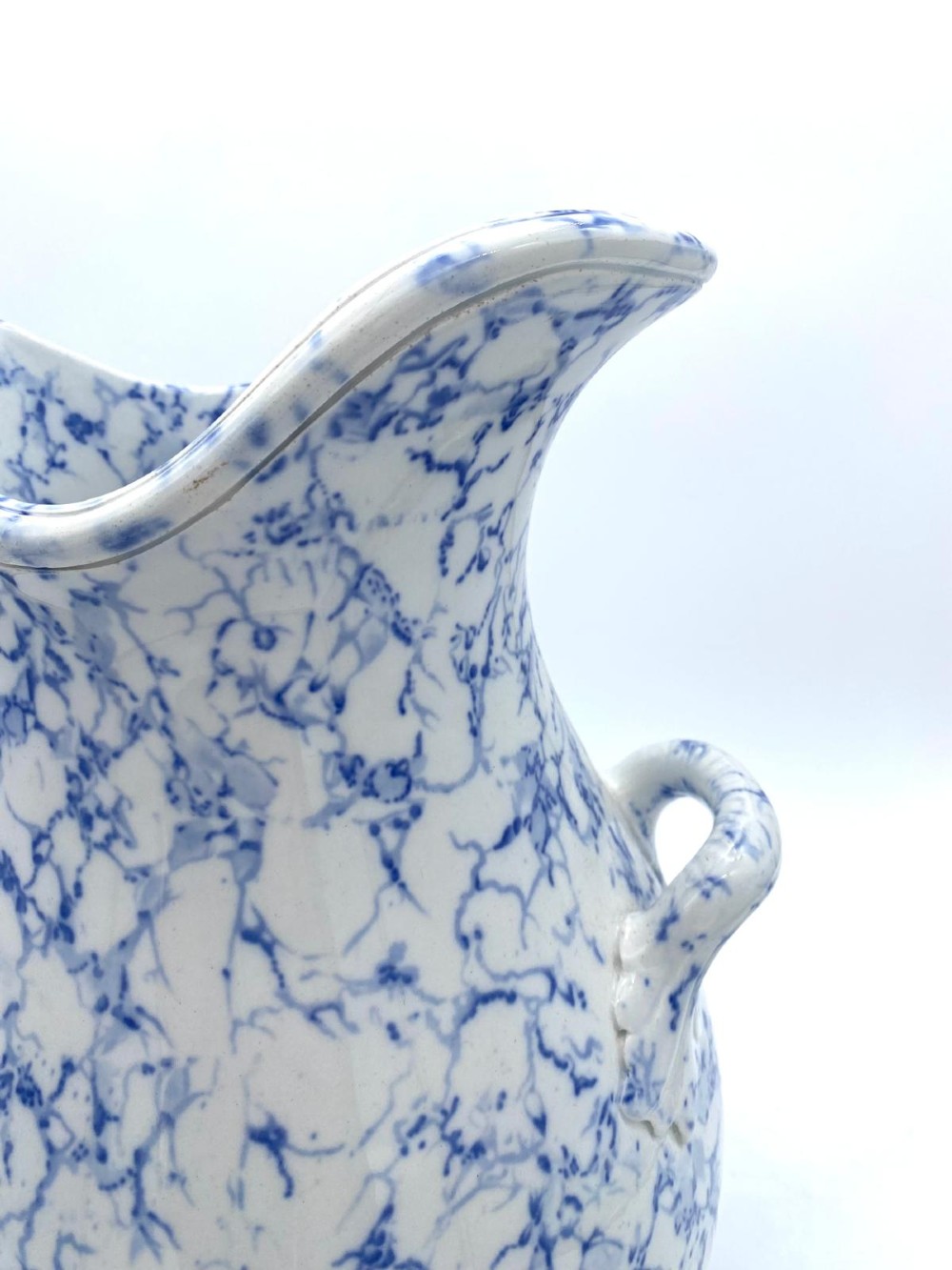 A mid-nineteenth-century Minton ceramic footbath and matching jug featuring a blue and white Italian marble transfer printed pattern. View XI