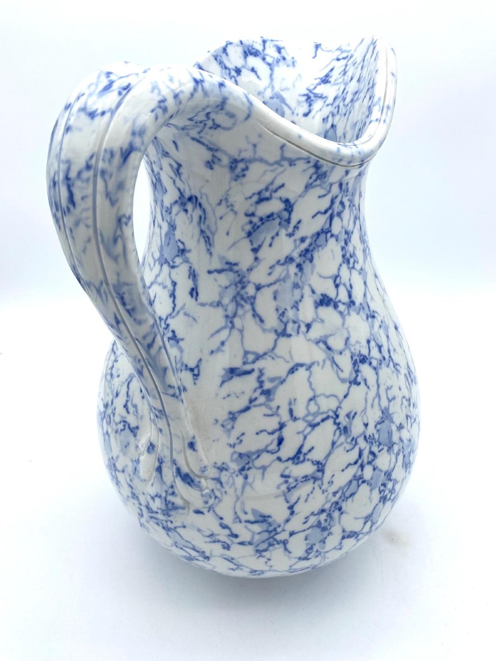 A mid-nineteenth-century Minton ceramic footbath and matching jug featuring a blue and white Italian marble transfer printed pattern. View XII