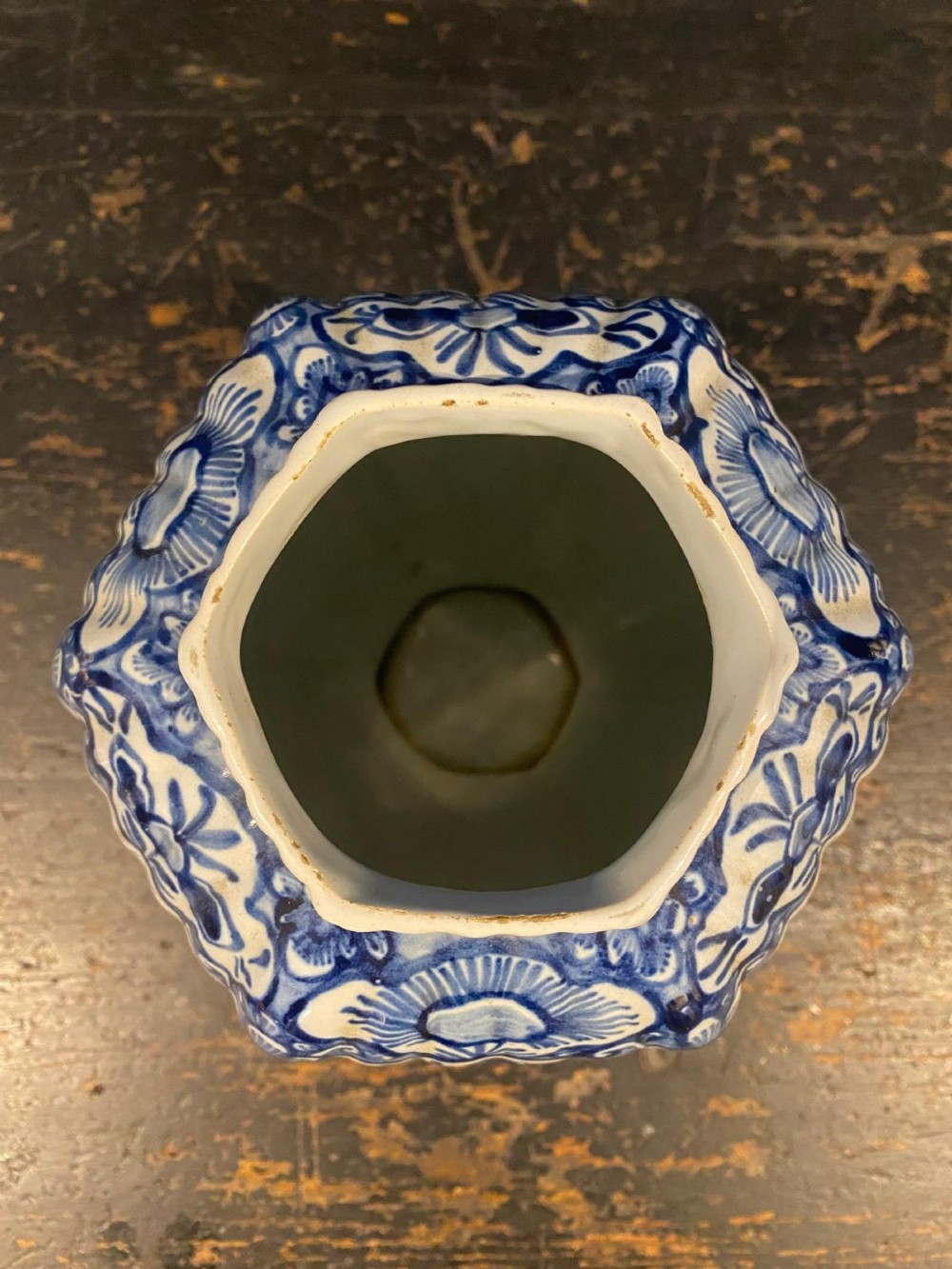 A pair of octagonal blue and white tin-glazed earthenware lidded vases decorated with hand-painted chinoiserie scenes and animal finials. View XI
