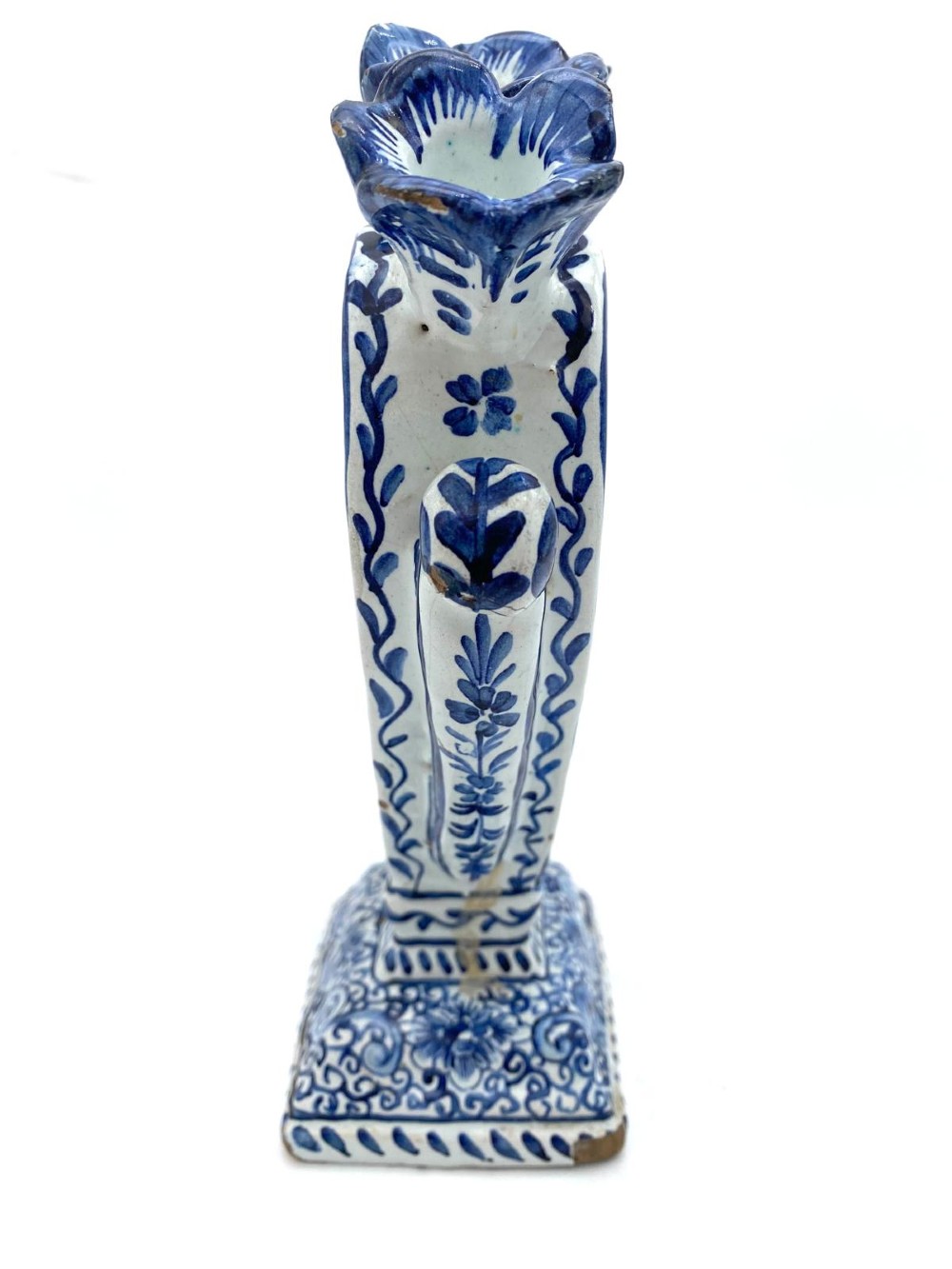 A pair of blue and white heart-shaped ceramic tulipieres featuring multiple spouts and hand-painted Dutch figures in landscape settings. View XIII