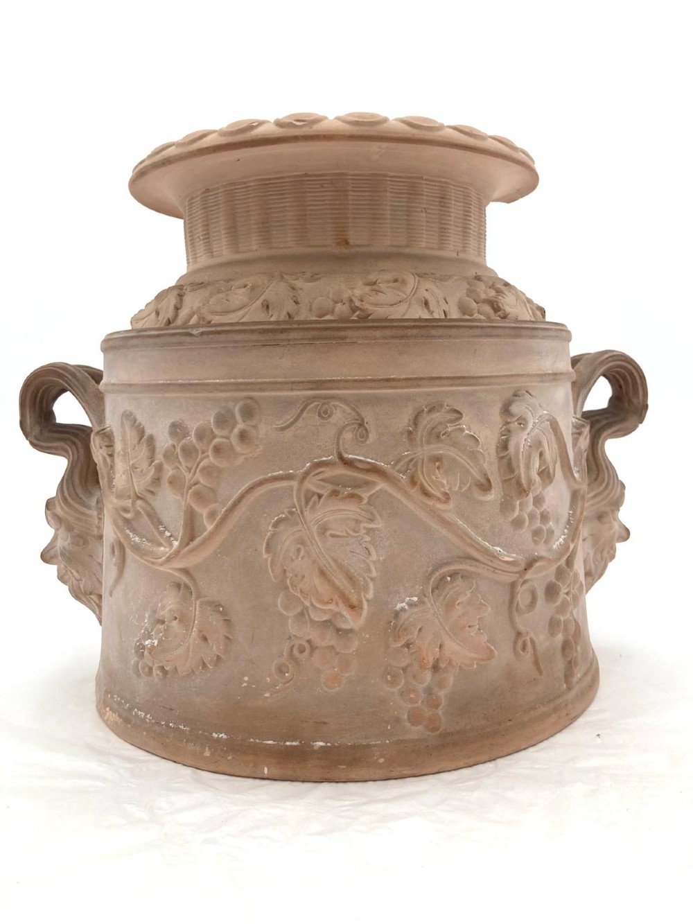 A 19th-century Davenport terracotta wine cooler featuring relief moulded grapevine motifs and twin scroll handles. View II