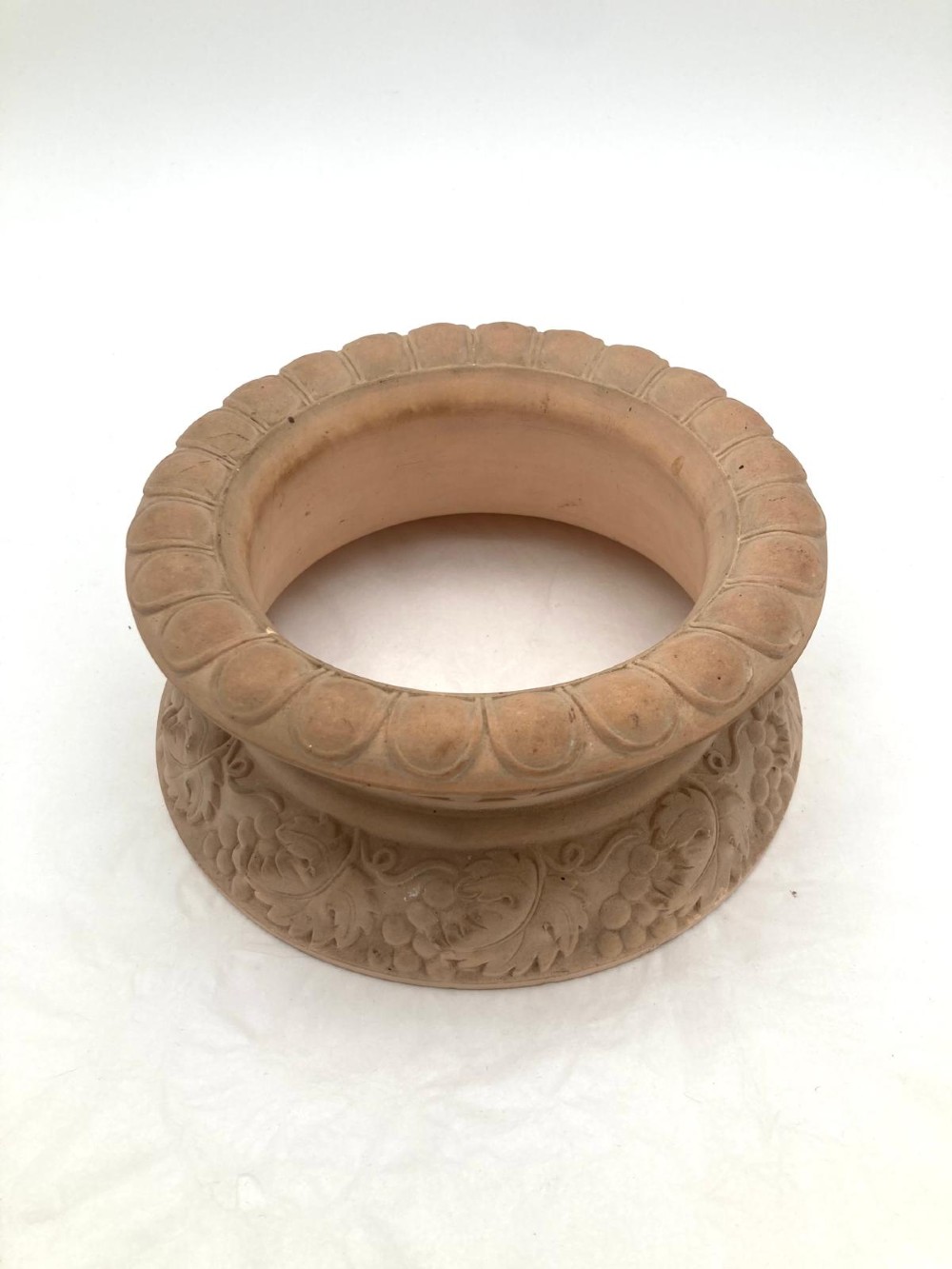 A 19th-century Davenport terracotta wine cooler featuring relief moulded grapevine motifs and twin scroll handles. View IX