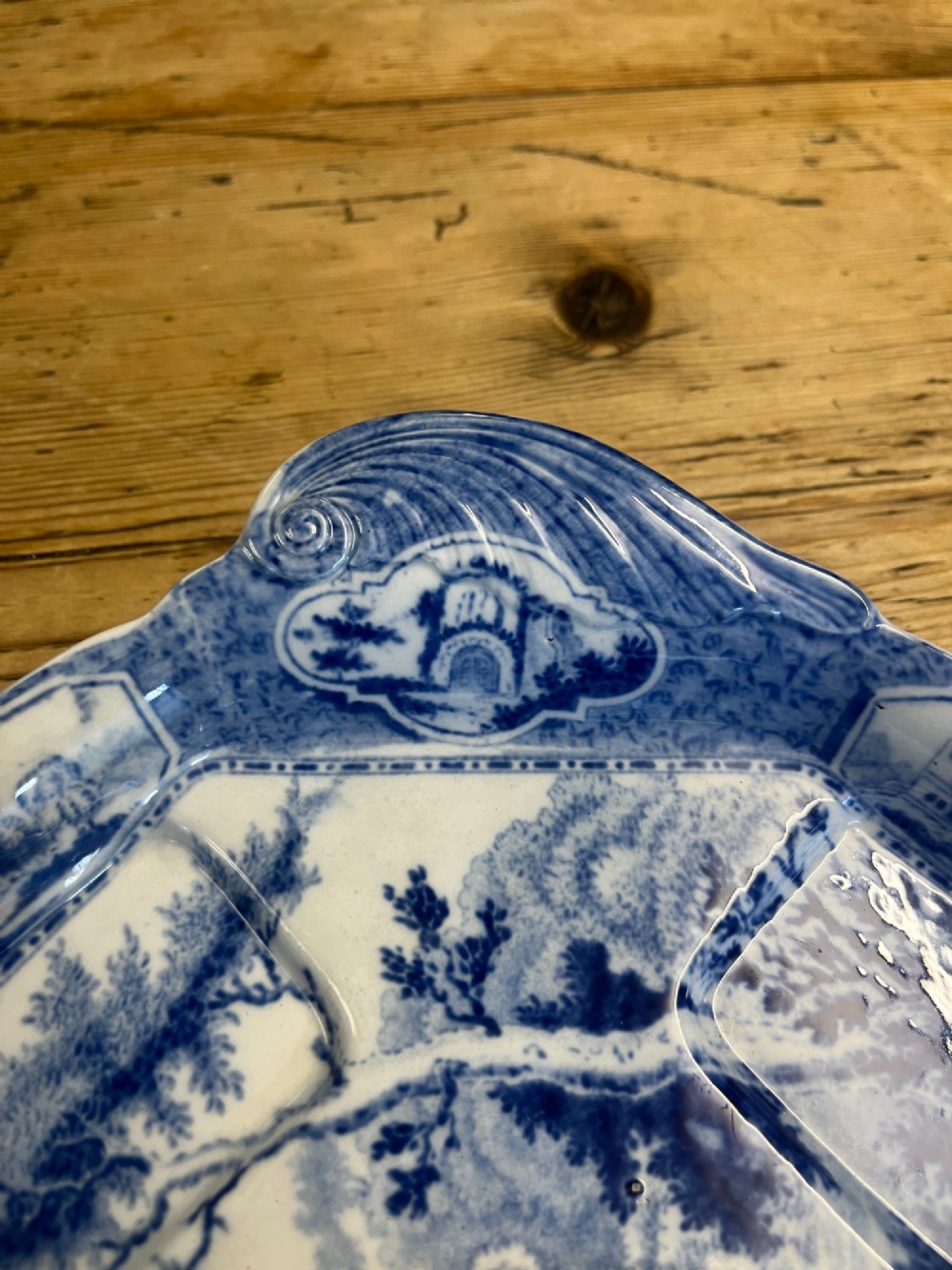 A nineteenth-century blue and white English transferware custard set featuring lidded pots arranged on a matching shaped tray. View VII