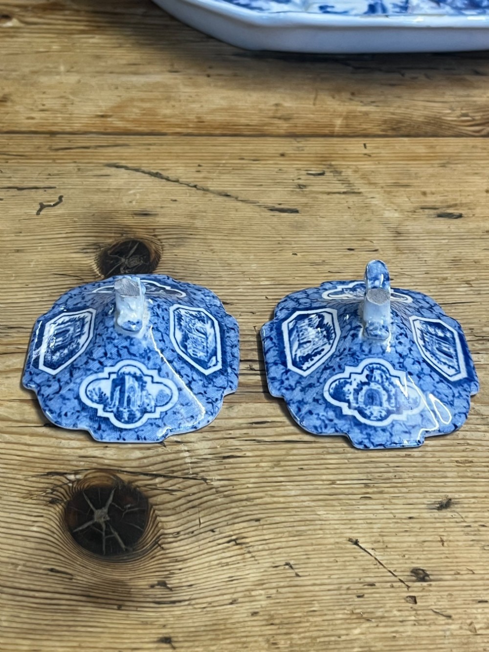 A nineteenth-century blue and white English transferware custard set featuring lidded pots arranged on a matching shaped tray. View XI