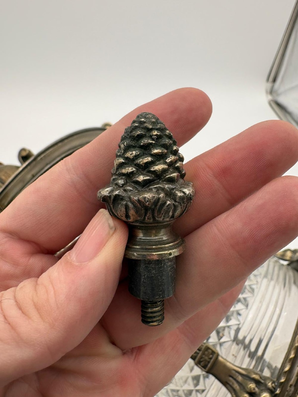 A late 19th-century cylindrical lantern featuring diamond-cut glass panels enclosed in a silvered bronze frame with classical pilasters and finials. View V