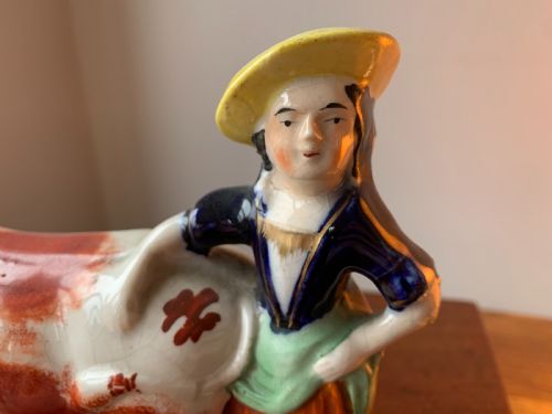 ANTIQUE STAFFORDSHIRE POTTERY COW AND MILKMAID FIGURE CREAMER JUG 19TH CENTURY - ADDITIONAL PHOTO 2
