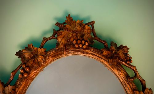 BLACK FOREST OVAL BEVELLED MIRROR EARLY 20TH CENTURY - ADDITIONAL PHOTO 1