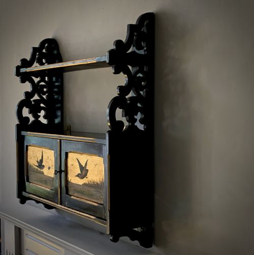 AESTHETIC MOVEMENT EBONISED WALL CABINET WITH GILDED PANELS PAINTED WITH BIRDS - ADDITIONAL PHOTO 1