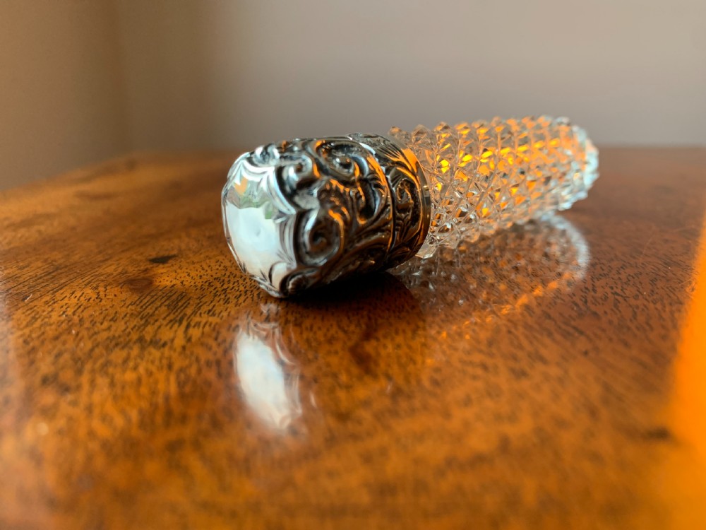 Cut crystal silver topped perfume bottle by Charles May, Birmingham, 1900