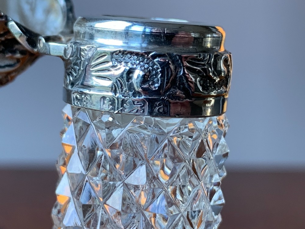 Cut crystal silver topped perfume bottle by Charles May, Birmingham, 1900 View X