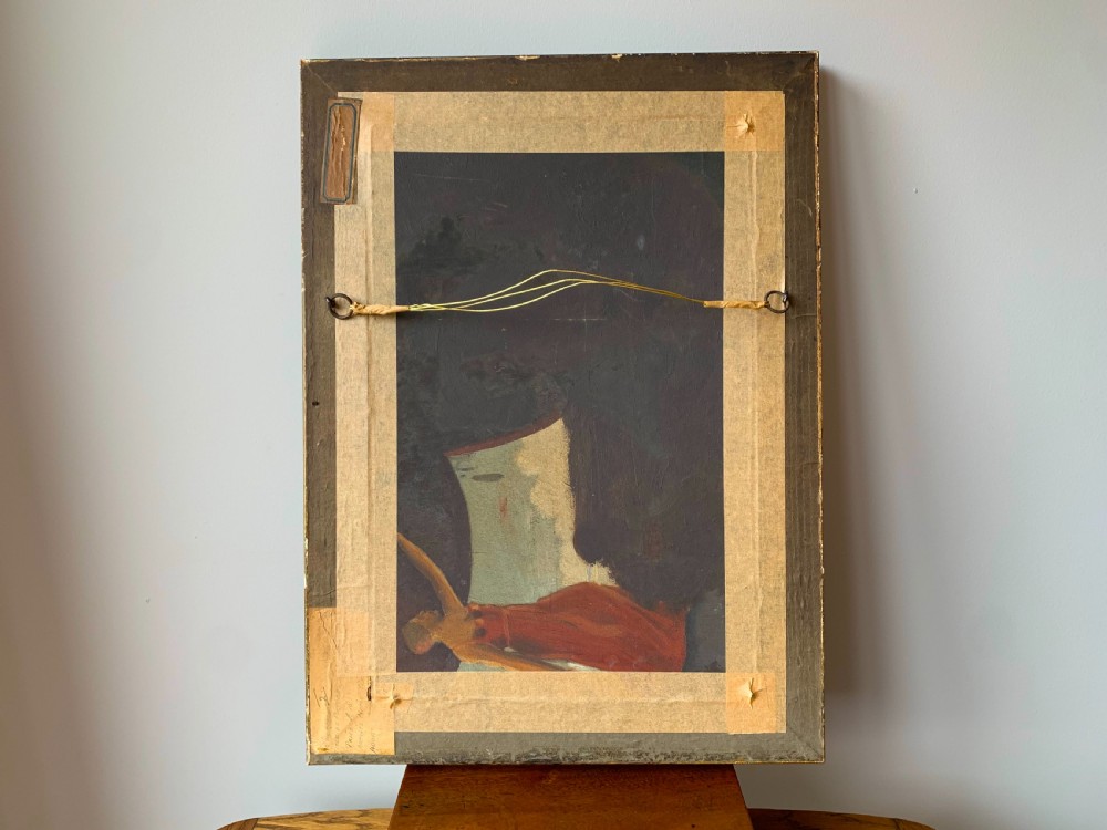 An unsigned Edwardian oil portrait on board depicting a young man in a blue jacket and striped tie, framed within an ornate carved giltwood frame. View VII