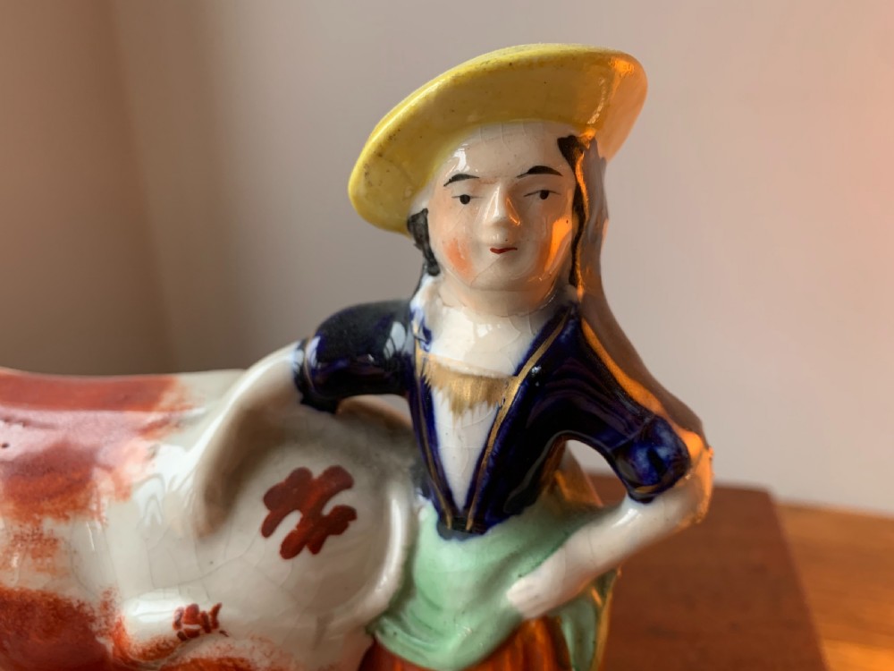 ANTIQUE STAFFORDSHIRE POTTERY COW AND MILKMAID FIGURE / CREAMER JUG, 19TH CENTURY View III