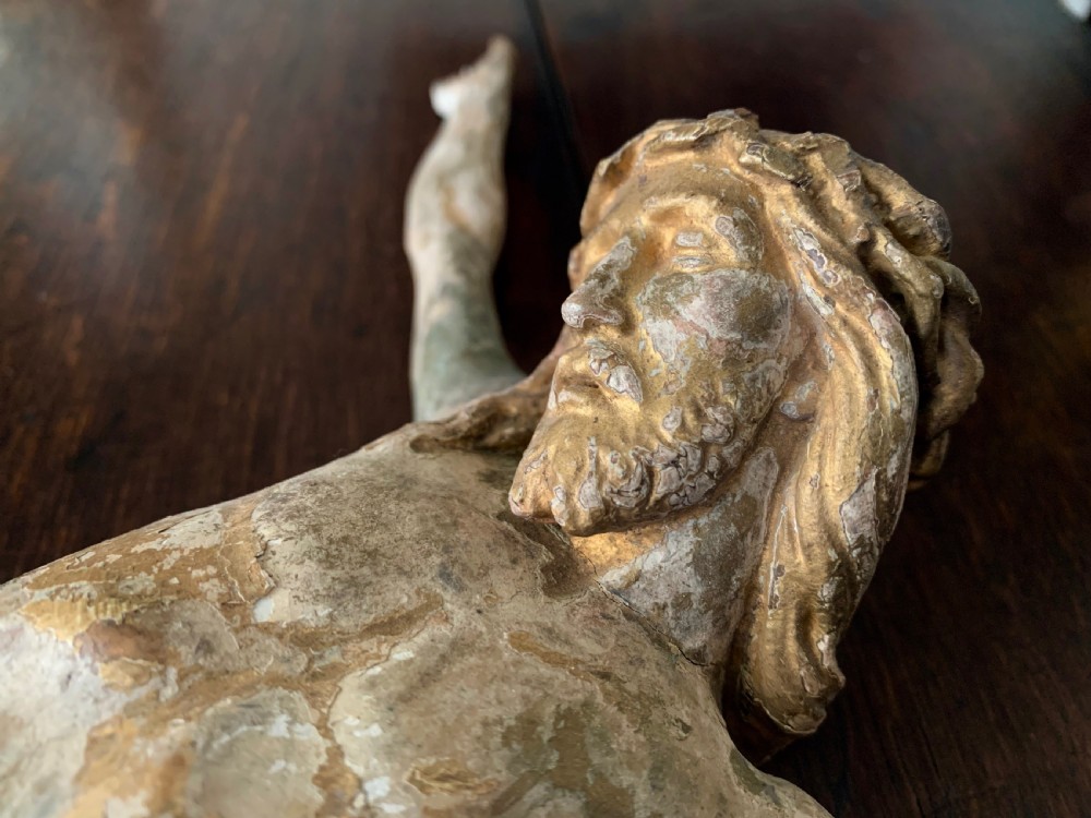 A 16th-century hand-carved lime wood Corpus Christi sculpture displaying remnant polychrome paint and gilding. View II