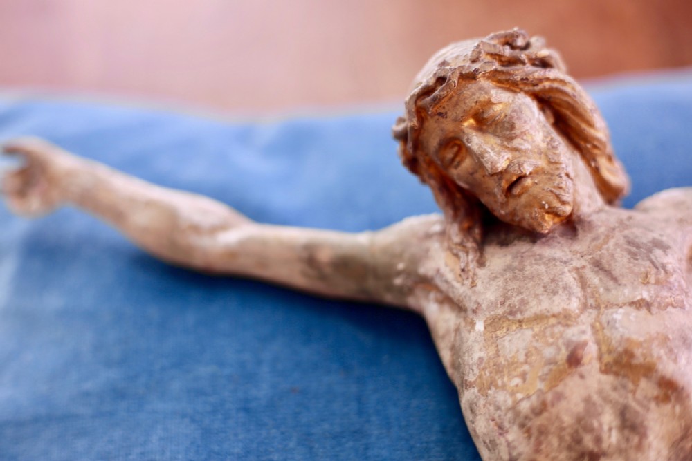 A 16th-century hand-carved lime wood Corpus Christi sculpture displaying remnant polychrome paint and gilding. View VI
