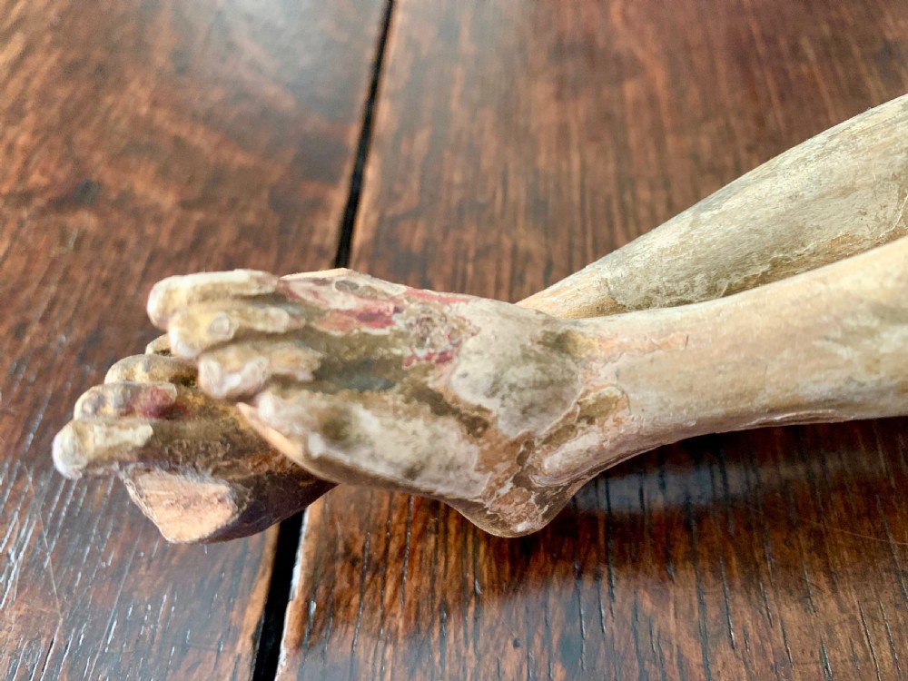 A 16th-century hand-carved lime wood Corpus Christi sculpture displaying remnant polychrome paint and gilding. View X