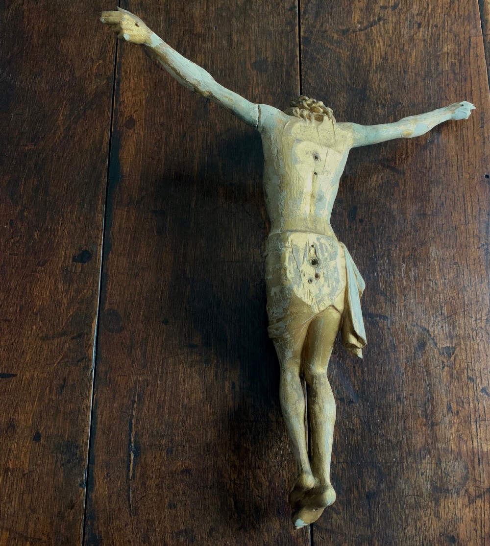 A 16th-century hand-carved lime wood Corpus Christi sculpture displaying remnant polychrome paint and gilding. View XIII