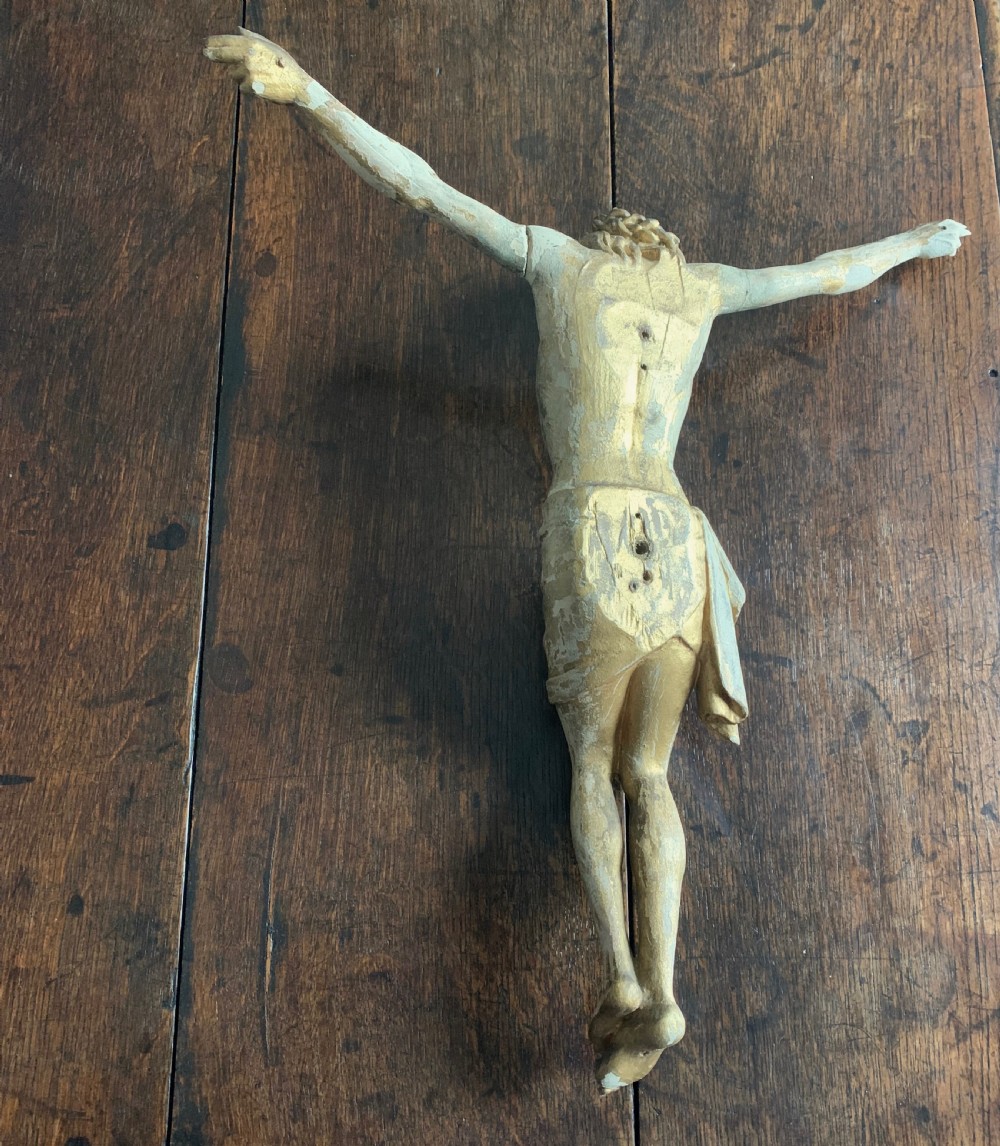 A 16th-century hand-carved lime wood Corpus Christi sculpture displaying remnant polychrome paint and gilding. View XV