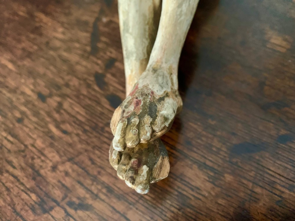 A 16th-century hand-carved lime wood Corpus Christi sculpture displaying remnant polychrome paint and gilding. View XVIII