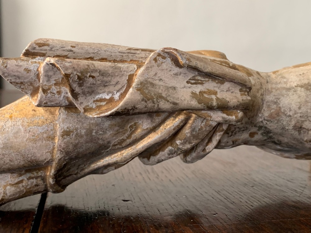 A 16th-century hand-carved lime wood Corpus Christi sculpture displaying remnant polychrome paint and gilding. View XXII