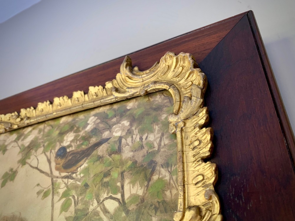 A horizontal Victorian print depicting three children in a garden setting, enclosed in a gilded Rococo-style inner frame set within a polished mahogany outer border. View VI