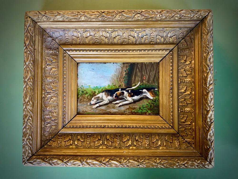 Pair of 19th-century English oil paintings on board depicting hunting hounds and foxes in deep gilt frames. View II