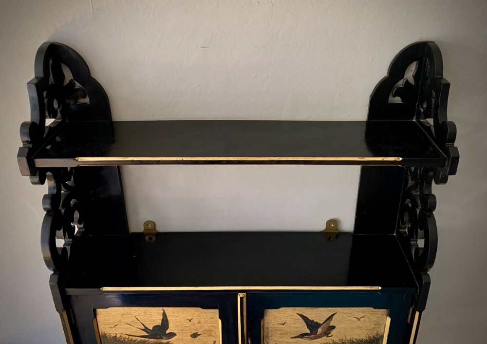 AESTHETIC MOVEMENT EBONISED WALL CABINET WITH GILDED PANELS PAINTED WITH BIRDS. View VII