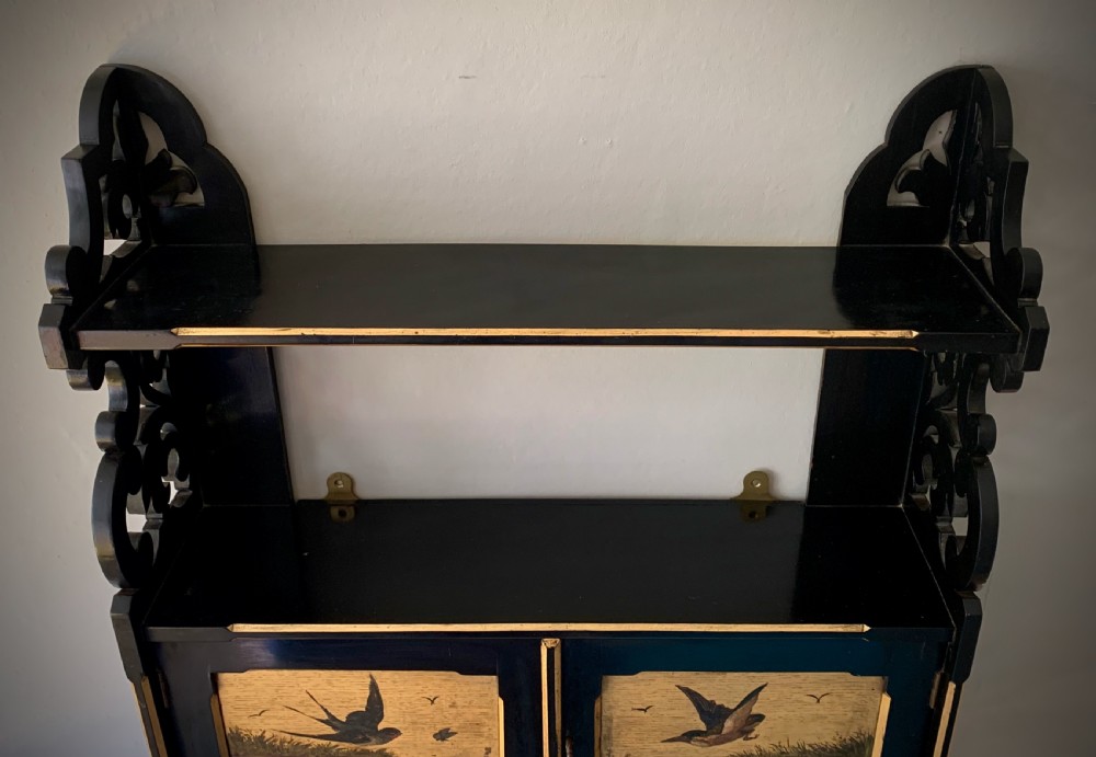 AESTHETIC MOVEMENT EBONISED WALL CABINET WITH GILDED PANELS PAINTED WITH BIRDS. View VIII