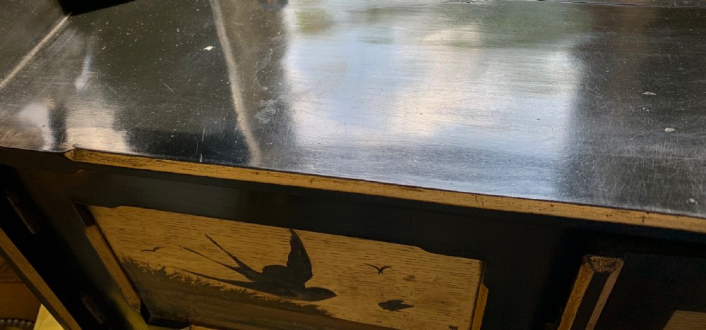 AESTHETIC MOVEMENT EBONISED WALL CABINET WITH GILDED PANELS PAINTED WITH BIRDS. View XIII